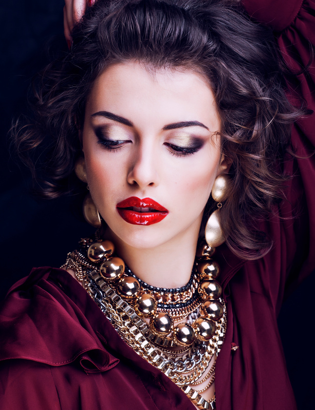 beauty rich brunette woman with a lot of jewellery, hispanic